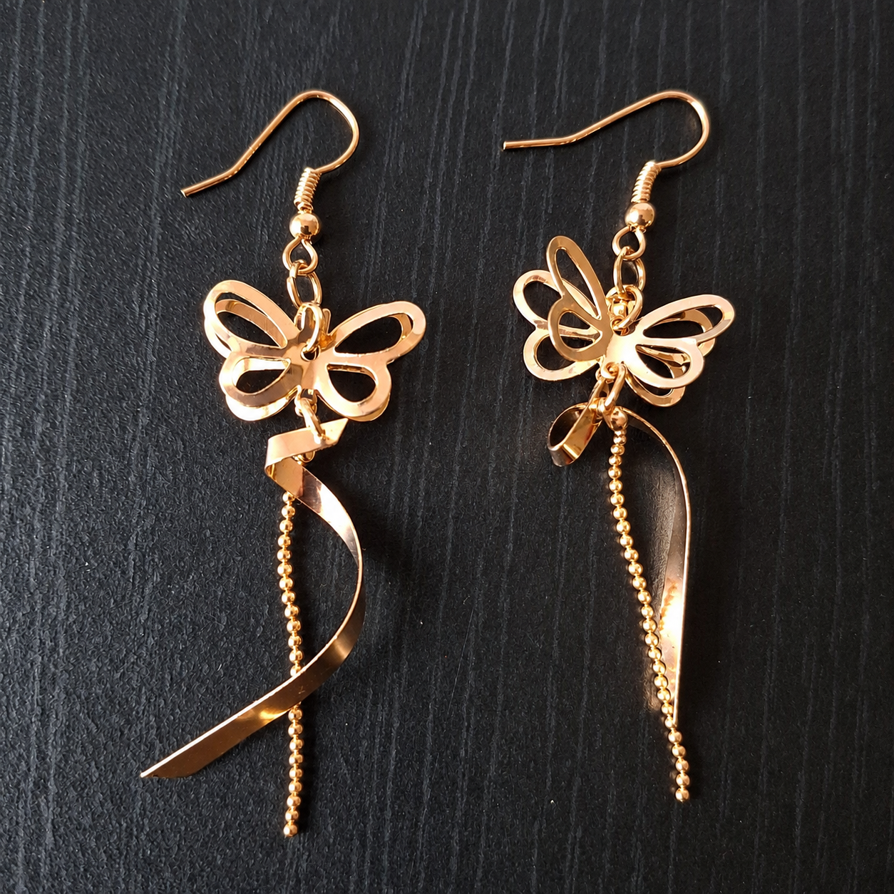 Gold Butterfly Drop Earrings - Image 2